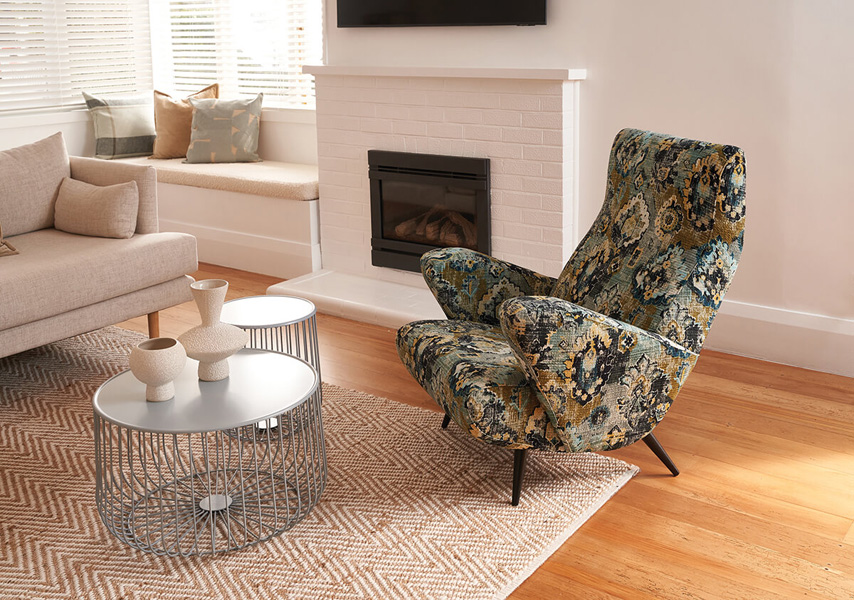 Ken-Chair-in-front-of-fireplace-5mb